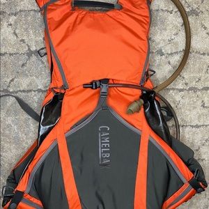 camelbak Upland Vest never used with a 100 oz hydration pack